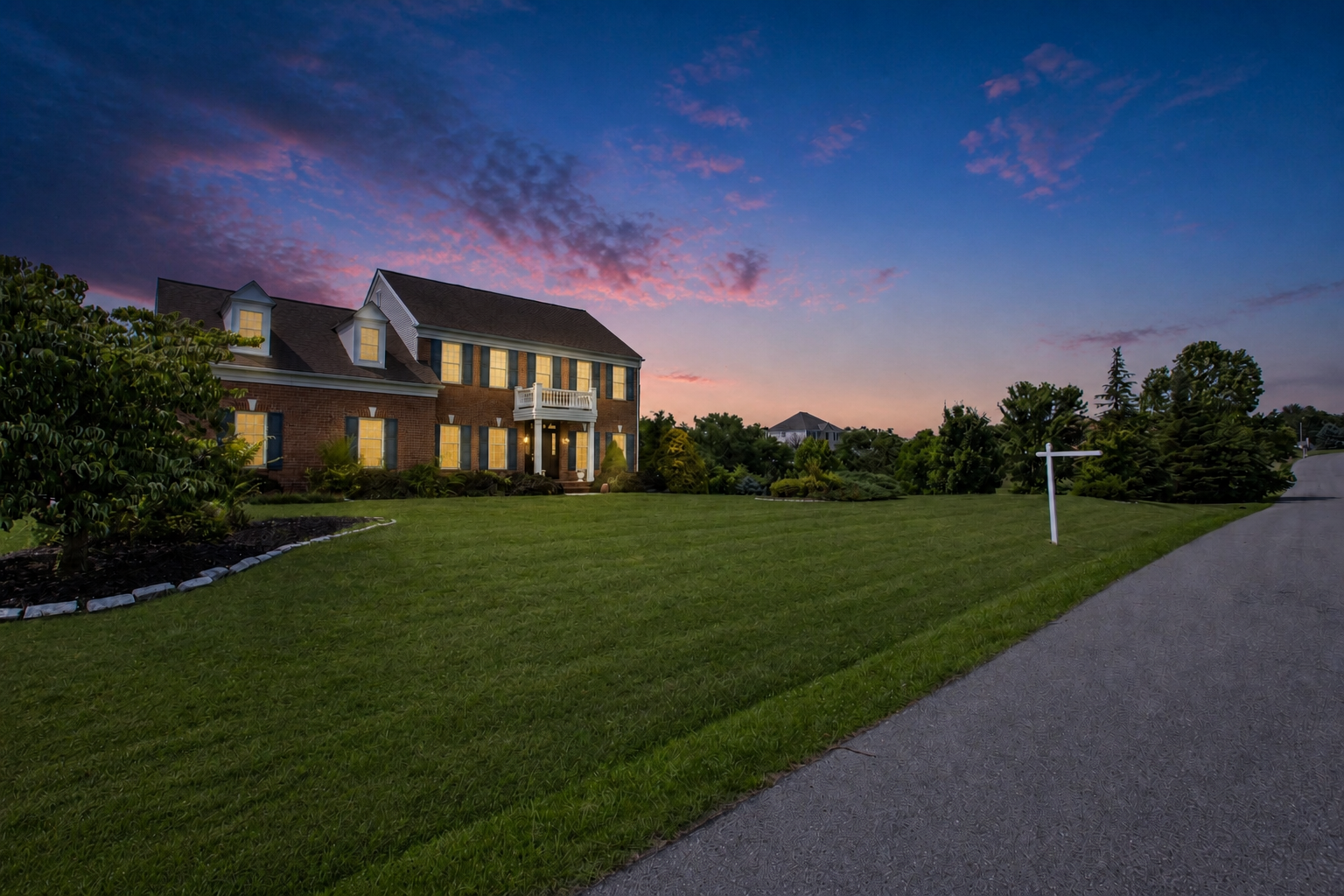 After — Front Exterior · Dusk